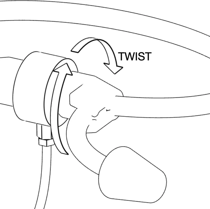 Twisting the attachment clockwise 90 degrees to lock it